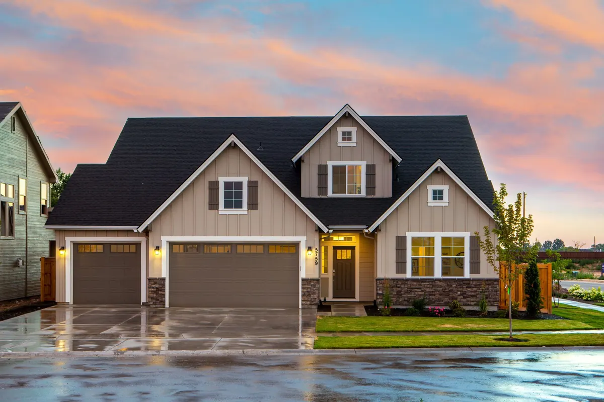Two-story family home with trees